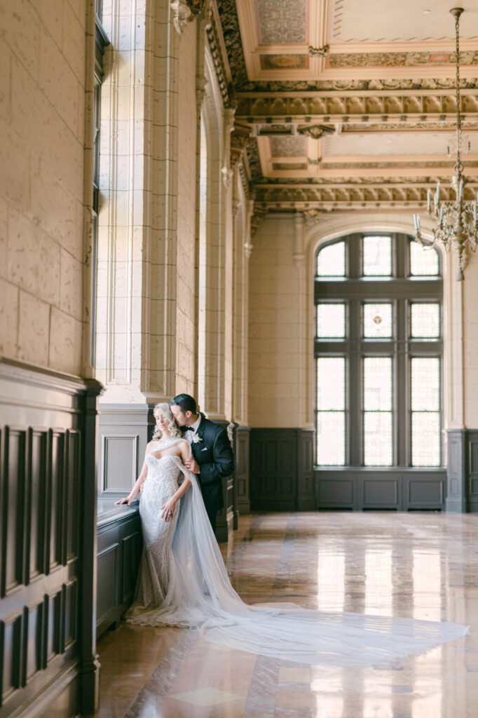 bride and groom sharing an intimate moment at the century club in kansas city