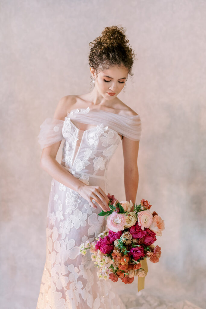 kansas city fine art bridal portrait with pink and dark red bouquet